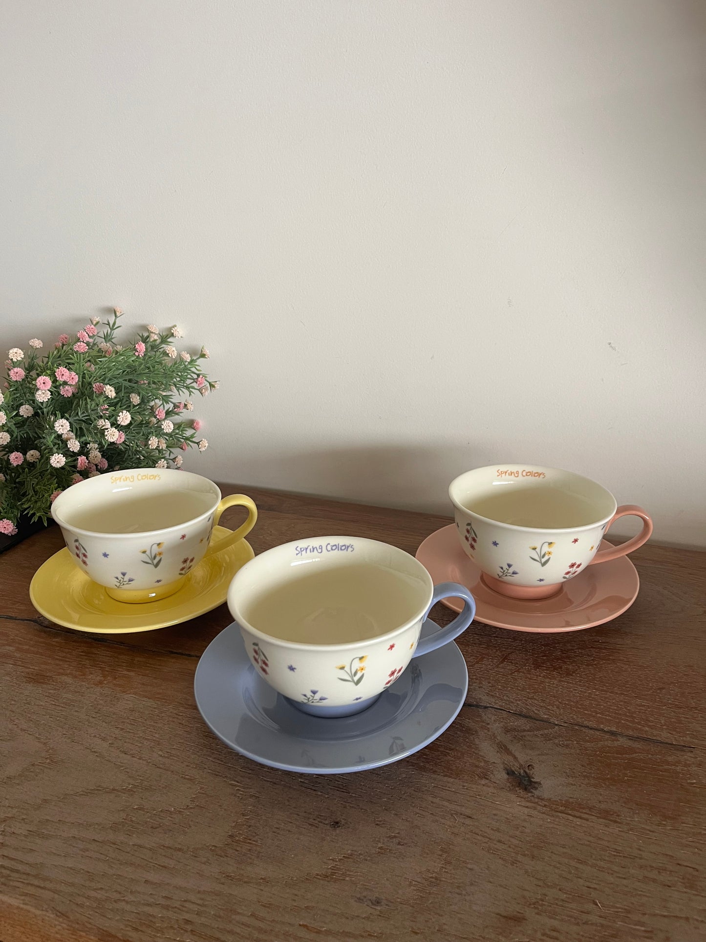 Colorful flowers mug with saucer